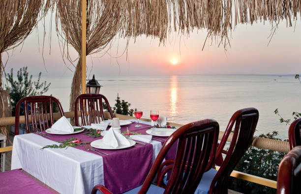 istock Dinner table and wines, preparation to evening meal 902879792