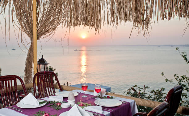 istock Dinner table and wines, preparation to evening meal 902879890