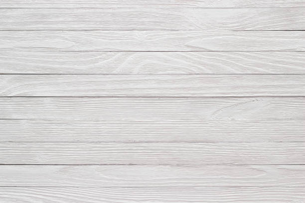 istock Light wood texture. Painted wooden table white 902882914