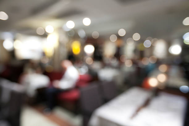 istock blurry background of restaurant with bokeh of light. 902883002