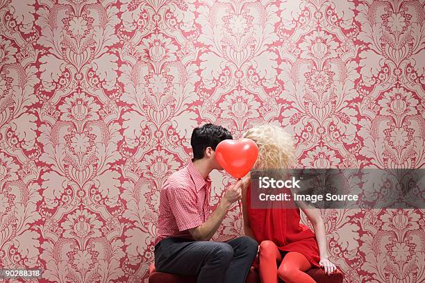 Couple Behind Heart Shaped Balloon Stock Photo - Download Image Now - Valentine's Day - Holiday, Love - Emotion, Heart Shape