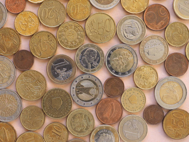 istock Euro coins, European Union background 902886080