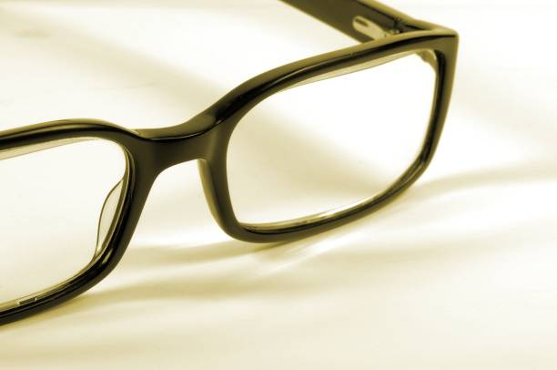 istock Black fashion reading glasses on white background. 902892600