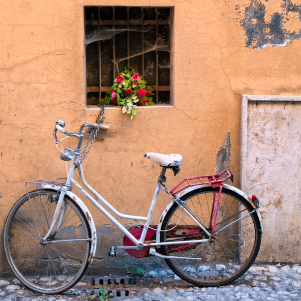 istock Rieti (Italy), white bicycle and flowers 902894210