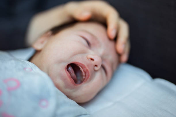 istock Mother calming the baby 902905142