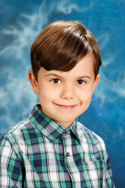 istock Portrait of a boy in a studio 902905782