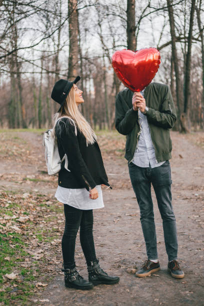 istock Young couple in the park 902910234