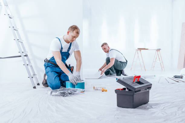 istock Home renovation crew finishing interior 902910376