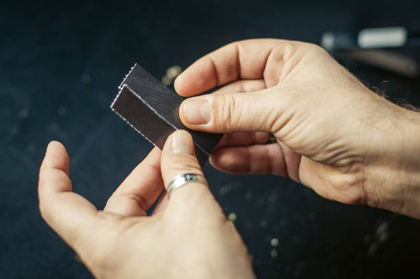 istock Preparing marijuana cannabis joint. Drugs narcotic concept 902920564