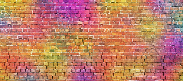 istock painted brick wall, abstract background of different colors 902922350