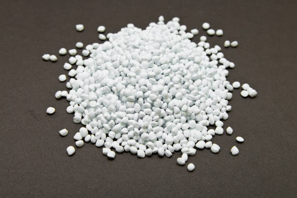Plastic pellets. White Colorant for plastics. Plastic Raw material Plastic pellets. White Colorant for plastics. Plastic Raw material polyethylene terephthalate stock pictures, royalty-free photos & images