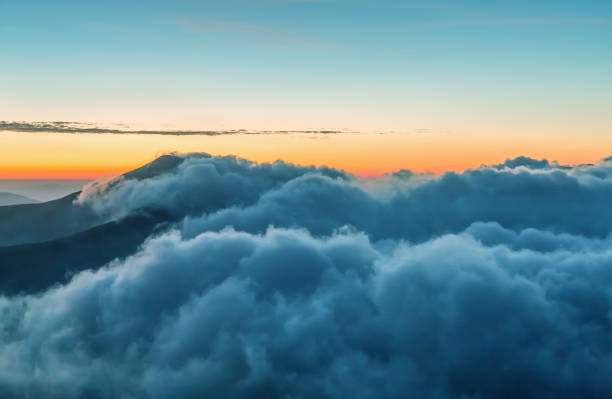 istock Twilight landscape of mountains with majestic cloudscape 902925500