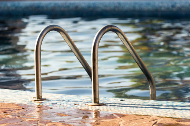 istock Ladder in the pool in the nature 902944164