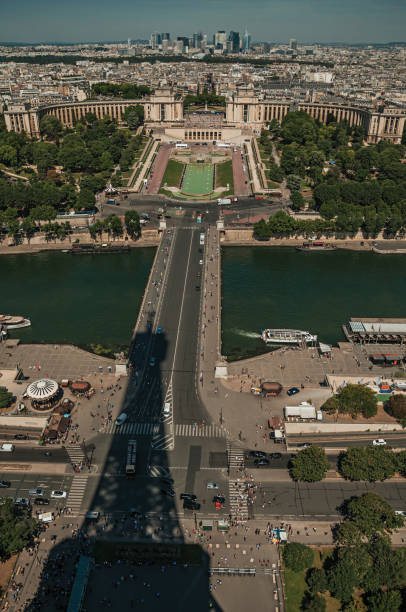 istock Skyline, River Seine with boats, Trocadero and Eiffel Tower shadow under blue sky in Paris. 902944390