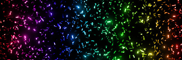 funkelnde metallic konfetti glitter streifen in den regenbogenfarben - vor einem schwarzen hintergrund (banner-format 3 x 1) - spectrum lighting equipment glamour defocused stock-fotos und bilder