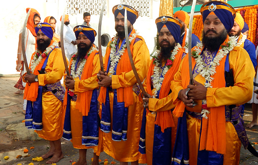 Sikh Punj Pyaares lead float with Guru Granth Sahib or Holy scripture ,in Nagar Keertan on birthday of Guru Nanak,on October 31,2017 in Secunderabad,India