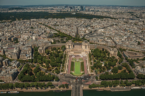Streets, greenery and Trocadero in a sunny day, seen from the Eiffel Tower top in Paris. Known as the “City of Light”, is one of the most impressive world’s cultural center. Northern France.