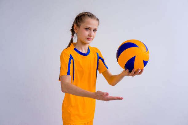 istock Girl playing volleyball 902958166