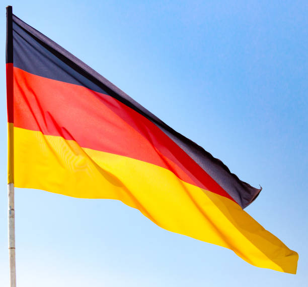 istock Flag of Germany against the blue sky 902960490
