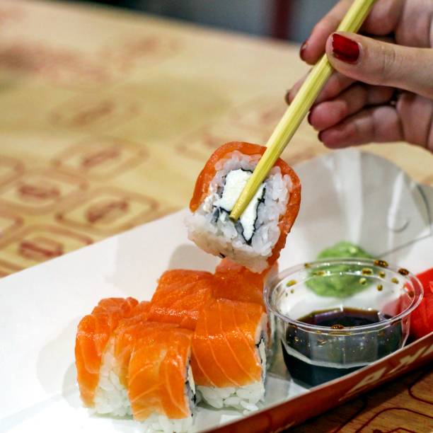 istock sushi rolls with red fish, wasabi and soy sauce - a meal 902960864