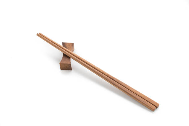 istock wood chopsticks isolated on white background 902962150
