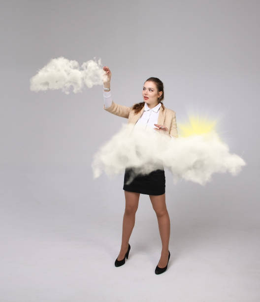 istock Woman with cloud and sun. Concept on the topic of computer cloud services 902962396