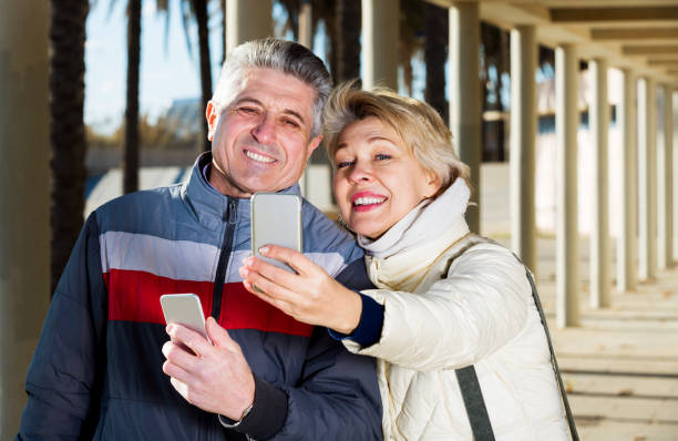 istock Mature couple doing selfie 902969932