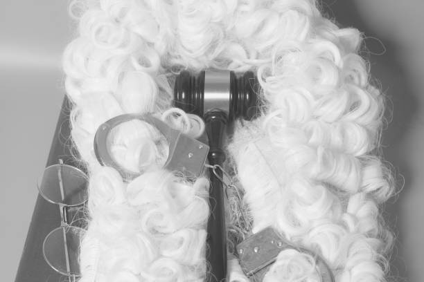 istock set for judge:judge wig,handcluffs, judge gavel,book end eyeglasses 902976148