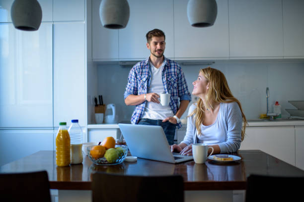 istock Young couple in the kitchen 902980328