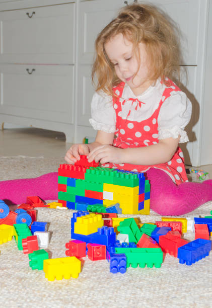 istock a girl plays in a designer home 902990358