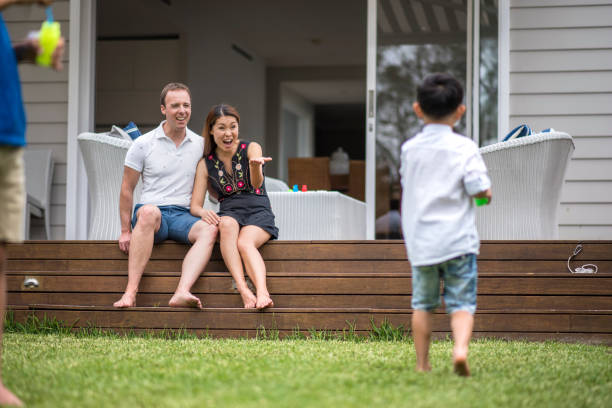 istock Brothers blowing bubbless outdoors 902990840