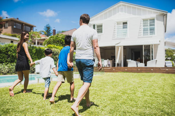 istock Family walking and holding hands 902990974
