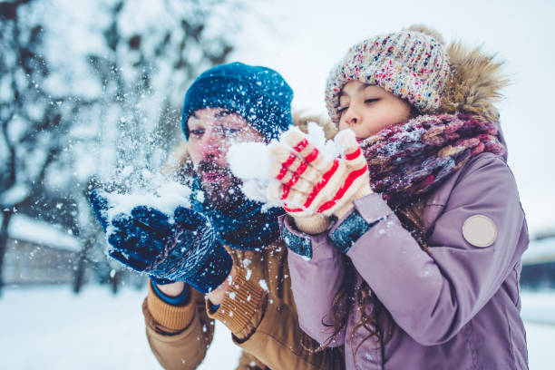 istock Dad with daughter outdoor in winter 902991438