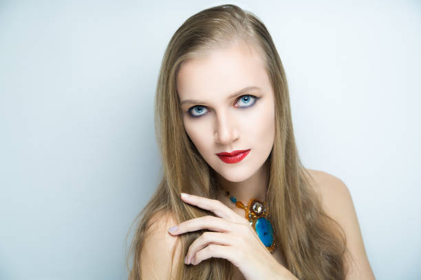 istock beauty young woman make up 902994026