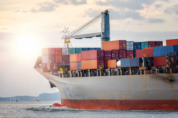 istock Logistics import export concept and transport industry of container cargo freight ship in the ocean at sunset sky, Freight transportation, Shipping 902994268