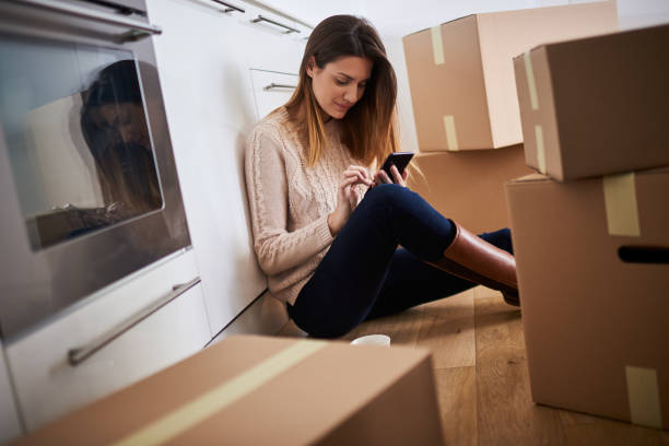 istock Woman in new appartment 902994426