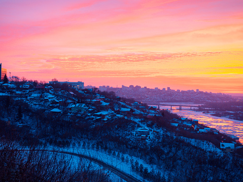 dramatic beautiful sunrise over the panorama of the city of Ufa