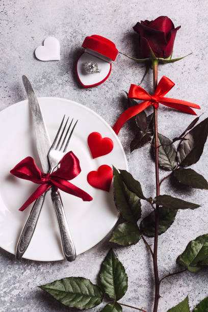 istock Valentines day table setting romantic dinner marry me wedding engagement ring in box 903012180