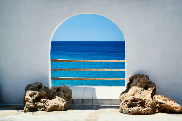 istock White stone cottages on the Aegean Sea 903015106
