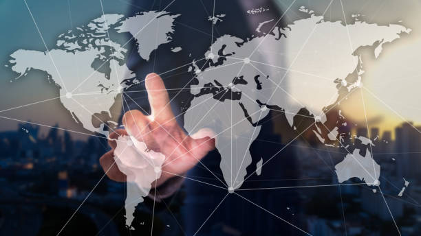 Double exposure of business man with worldmap, connection dots and city scape background. Globalization concept. stock photo