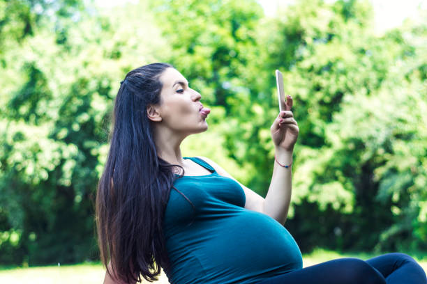 istock Woman relaxing in a park 903022436