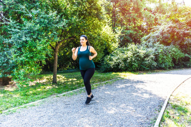 istock Pregnant woman exercising 903022452