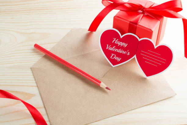 istock Letter with heart greeting card and present 903023500
