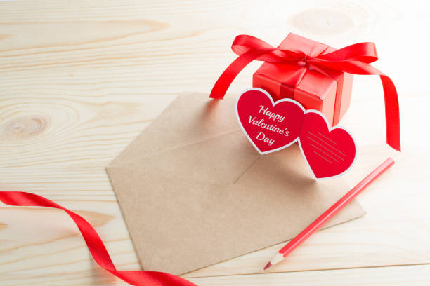 istock Letter with heart greeting card and present 903023508