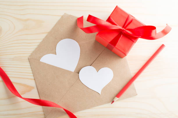 istock Letter with heart greeting card and present 903023546