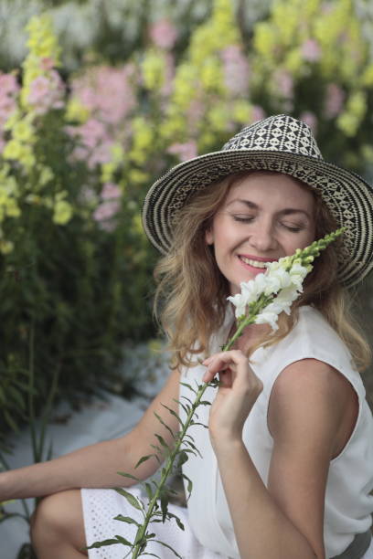 istock Young woman at a farm. Gardener. 903023814