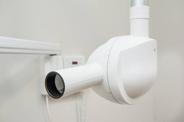 istock X-ray machine in the dental clinic. Selective focus 903030546