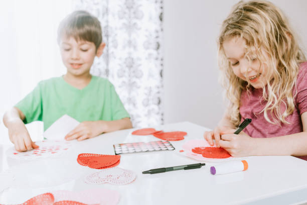 istock Children Making Valentine's Day Cards 903031192