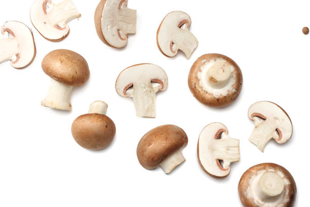 istock Fresh champignon mushrooms isolated on white background. top view 903031808
