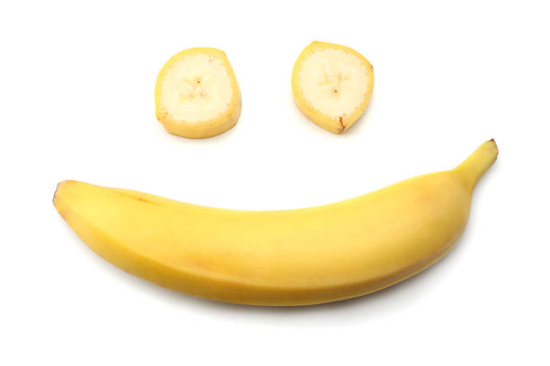 istock banana isolated on white background top view 903034374
